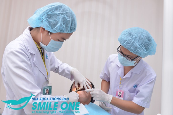 nhổ răng khôn vẫn còn sót chân răng