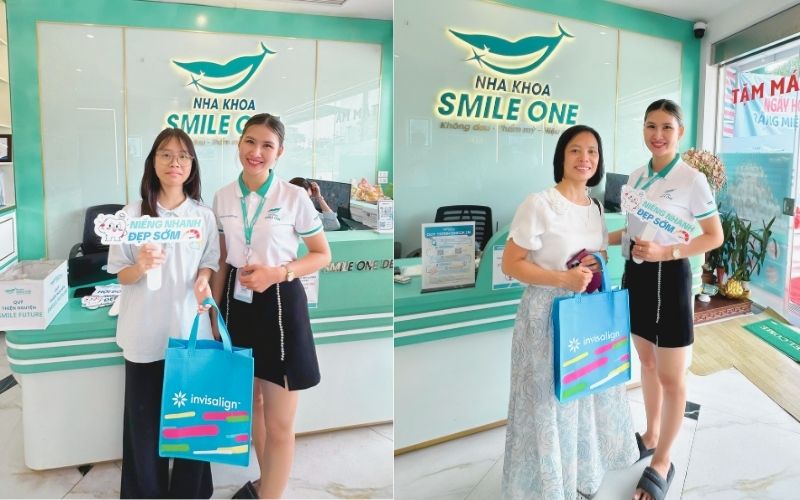 Khách hàng tại chi nhánh Nha khoa Smile One Biên Hòa - Đồng Khởi đang tươi cười, đứng chụp ảnh lưu niệm với nhân viên của nha khoa